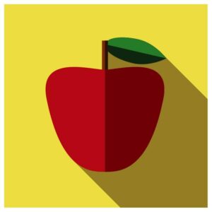 A red apple on yellow background