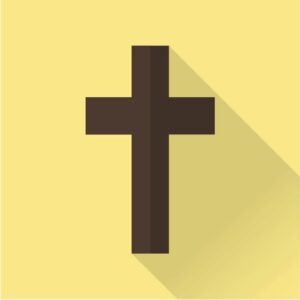 Brown cross with a shadow on a gold colored background