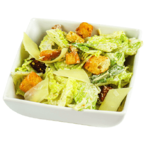 Caesar salad romaine lettuce tossed with caesar dressing and garnished croutons parmesan cheese