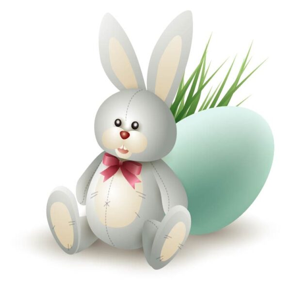 Easter bunny with egg and grass