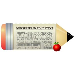 Newspaper in education with apple and pencil