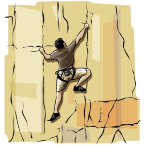 Rock climber climbing up a cliff