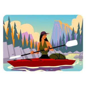 Smiling girl with paddle and kayak on a small river