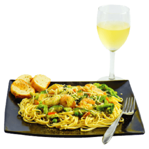 Spaghetti and green curry sauce and glass of wine with cuisine green thai