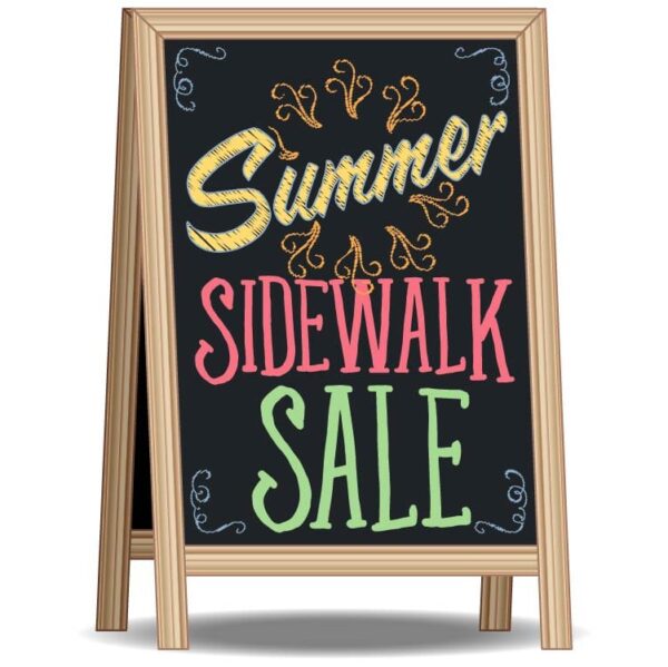 Summer sidewalk sale written on standee board
