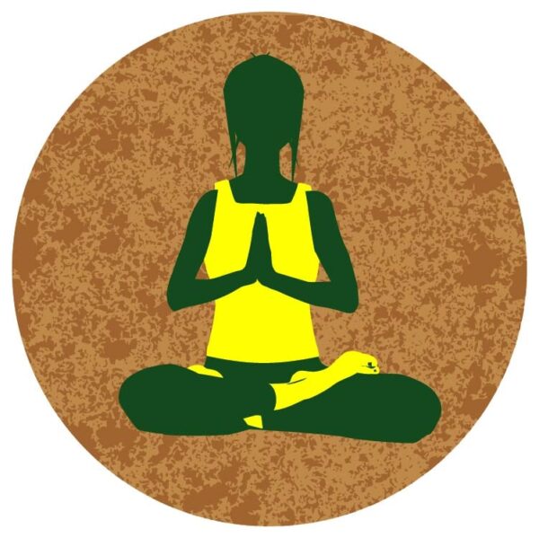Woman in yoga prayer position wearing a yellow & green solid colour workout outfit