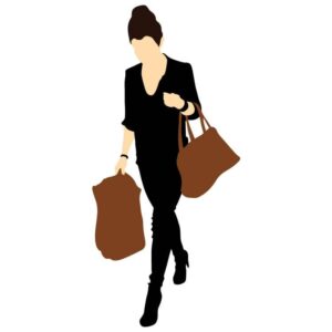 Woman walking with handbag and shopping bag