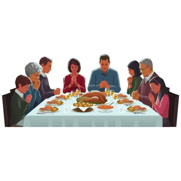 All family members pray on dinner table before the dinner
