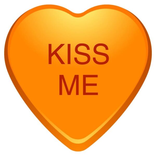 Kiss me slogan on tangerine color heart shape for love heart valentine day