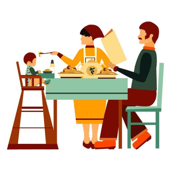 Parents and child dining and talking at dinner table