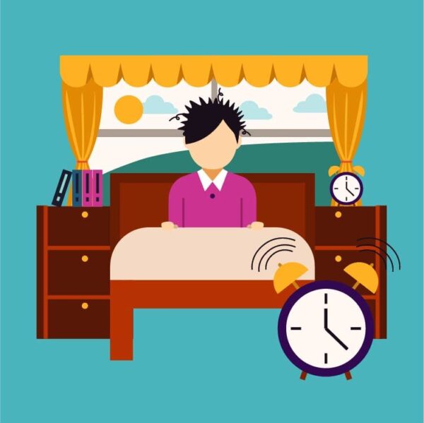 Wake up boy in bed on alarming clock