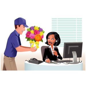 Delivery man giving flowers and present to pretty woman at office