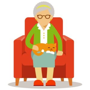 Grandma sitting on the sofa holding a cat