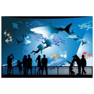 Sharks in oceanarium big aquarium with underwater fishes and people