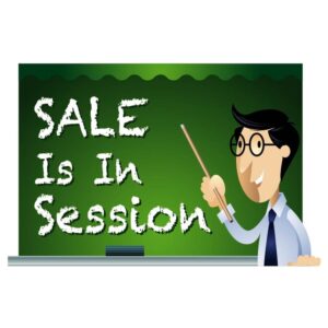 Sale is in session written on blackboard and teacher teaching in classroom-01-min