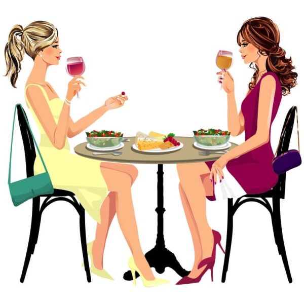 Two women holding glass of wine at a table full of snacks chatting and talking at home bar restaurant club